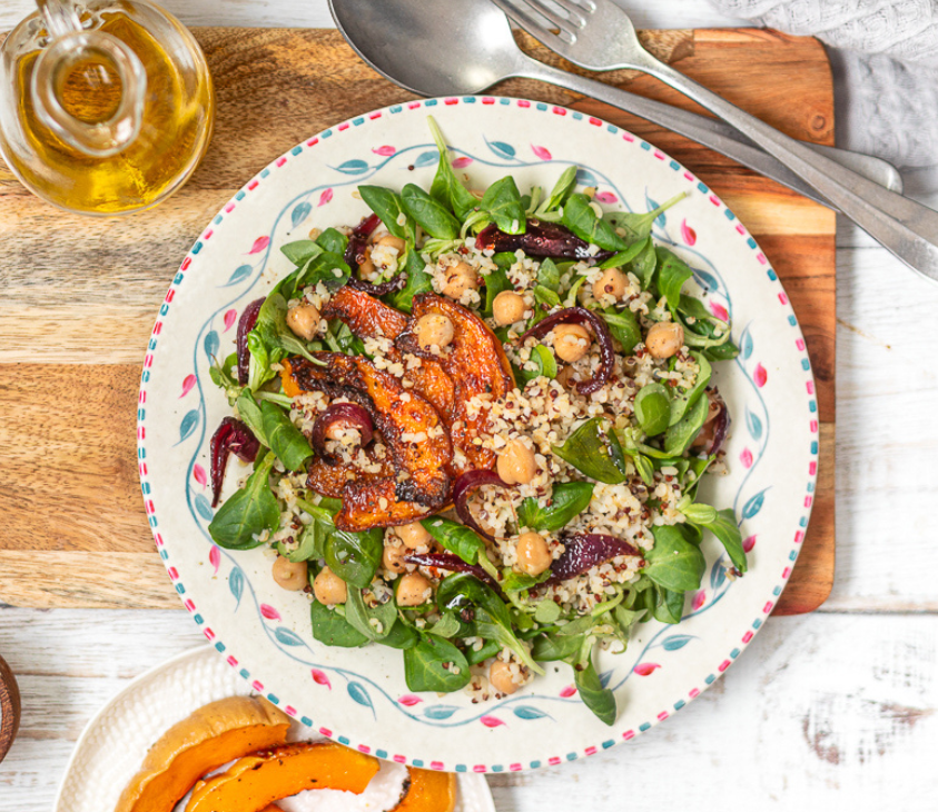 Salad with pumpkin, chickpeas, valerian, red onion in Balsamic